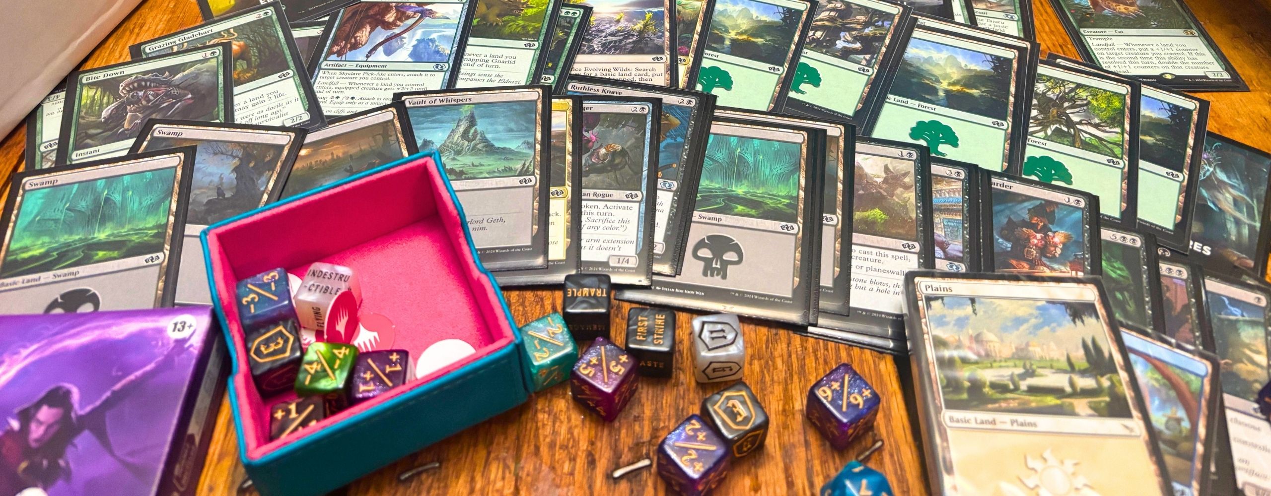 Magic the Gathering (MTG) cards, dice, commander boxes, and more from Fates Collectibles
